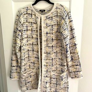 Size medium, multi-color knit sweater cardigan. Light blue and cream tones